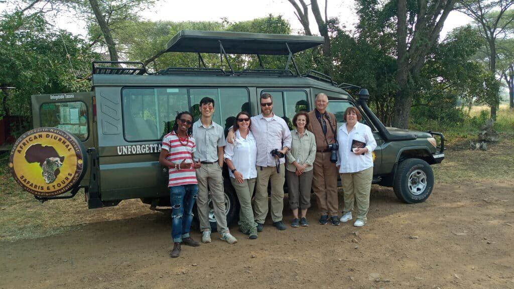 Our Guests and Guide at Ndabaka Entrance Gate Our Guests and Guide at Ndabaka Entrance Gate