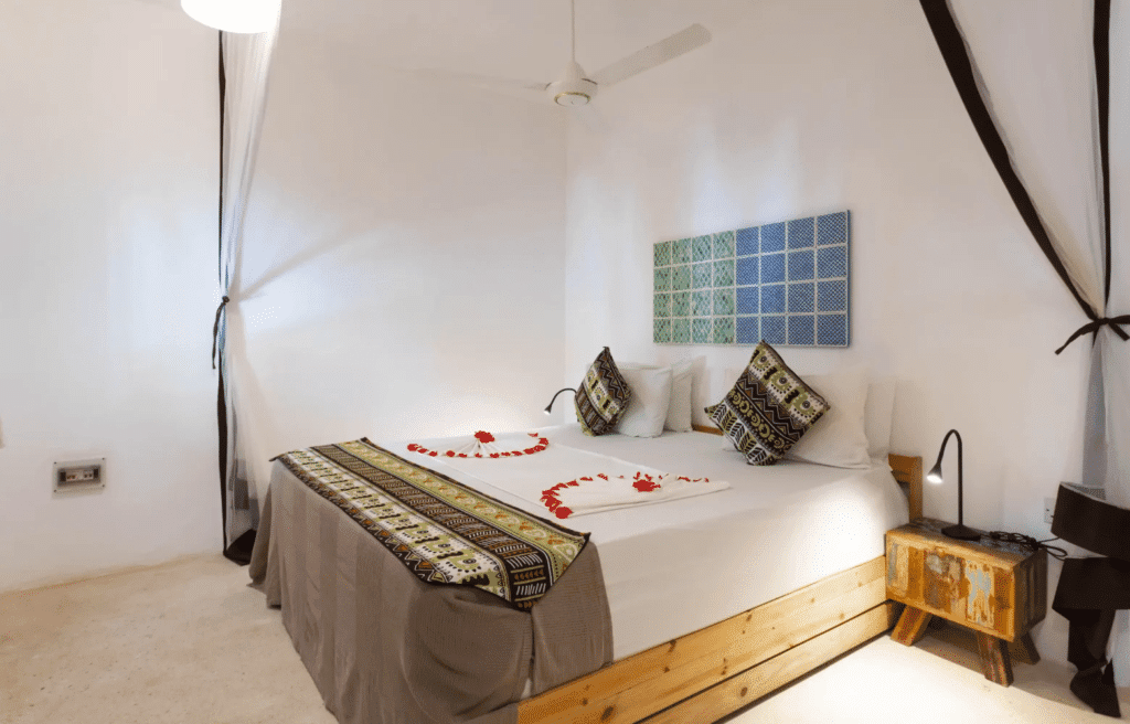 fun beach hotel zanzibar back pool room double bed