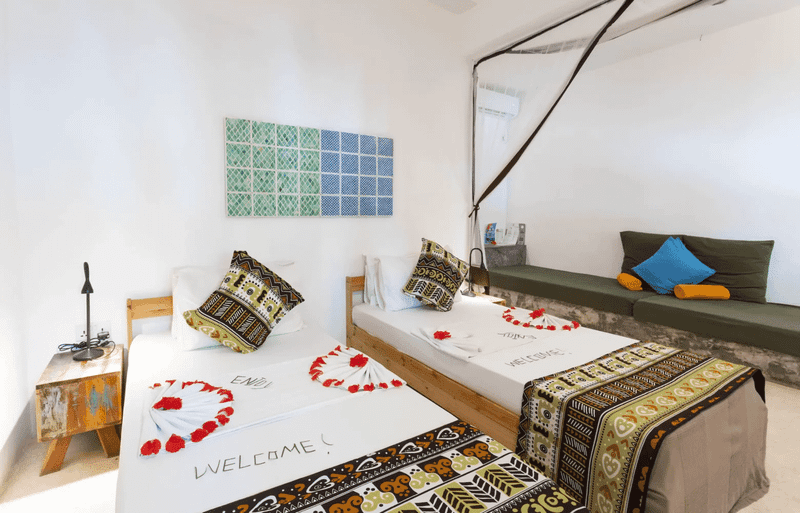 fun beach hotel zanzibar back pool room twin bed